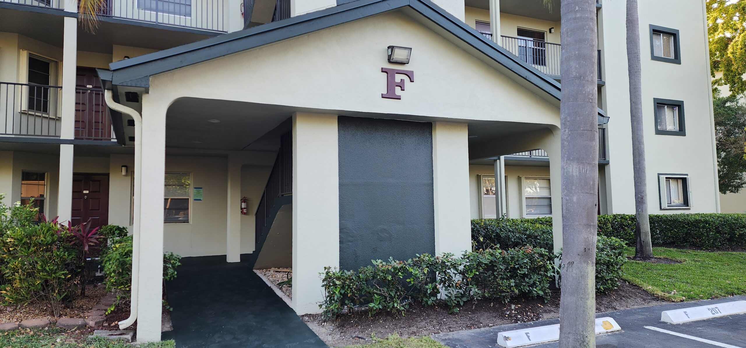 Completed exterior repairs after structural issues and water intrusion resolved during milestone inspection.